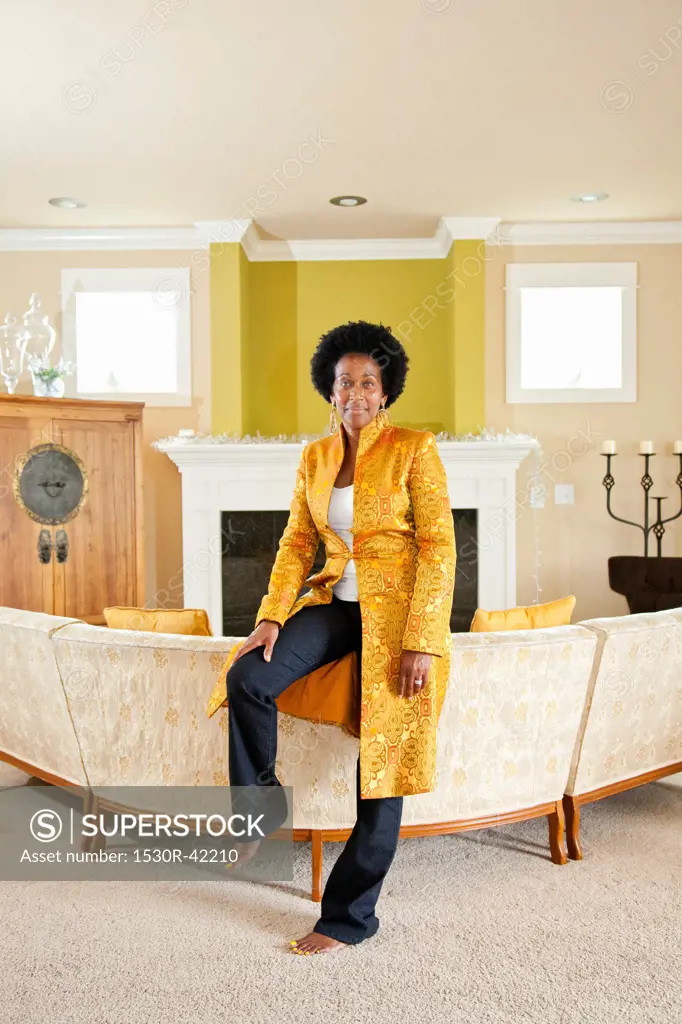 Elegant woman in formal living room