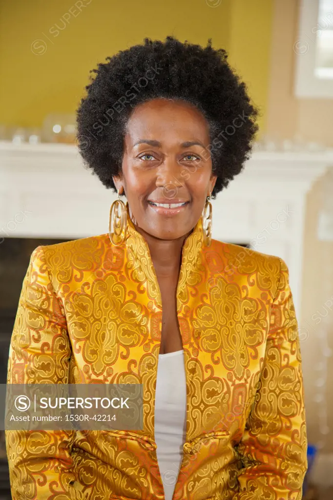 Portrait of elegant woman in gold jacket