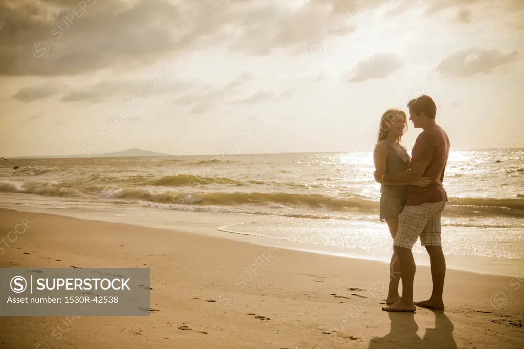 Romantic young couple on beach