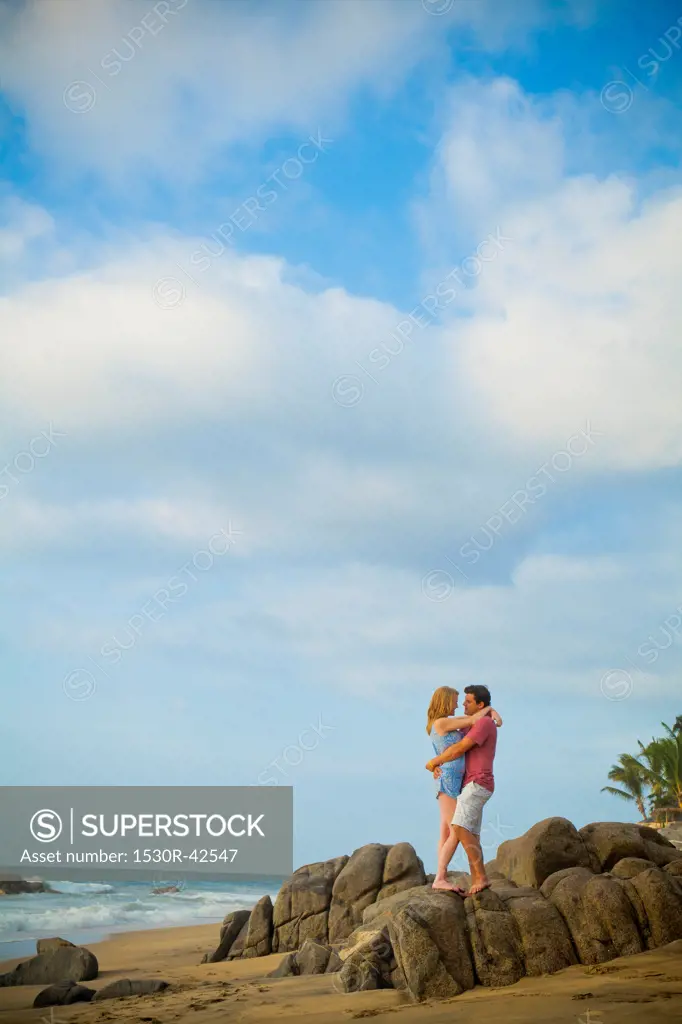 Romantic young couple on beach