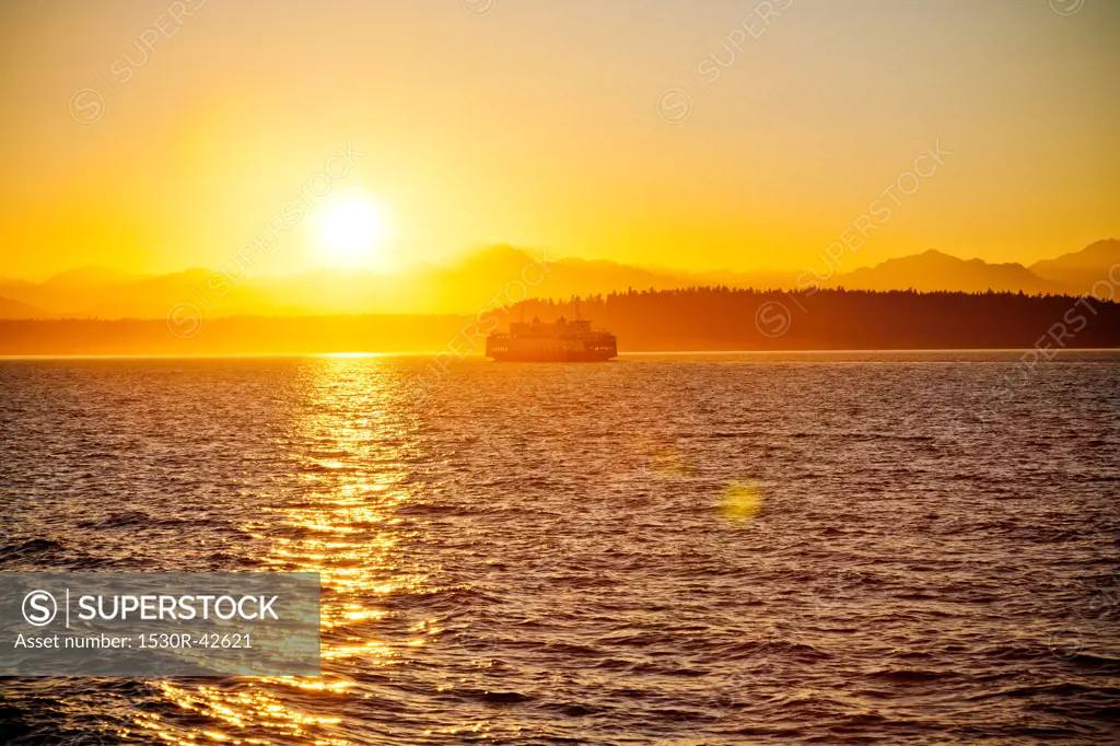 Ferry on puget sound at sunset