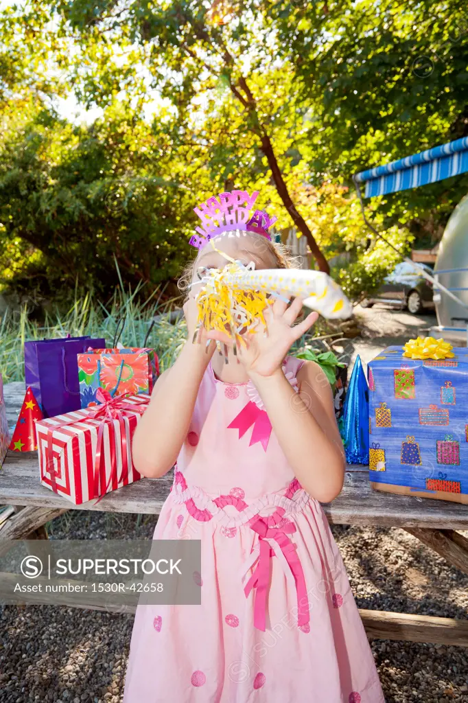 Young girl in birthday party outfit
