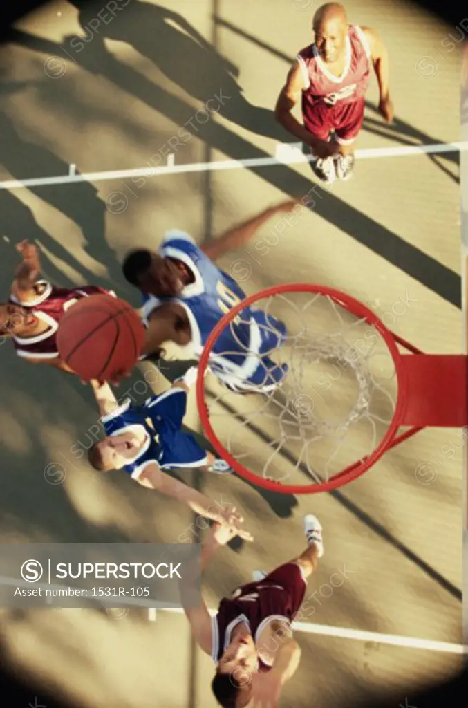 High angle view of men playing basketball