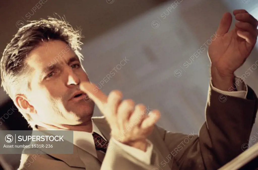 Businessman gesturing with his hands