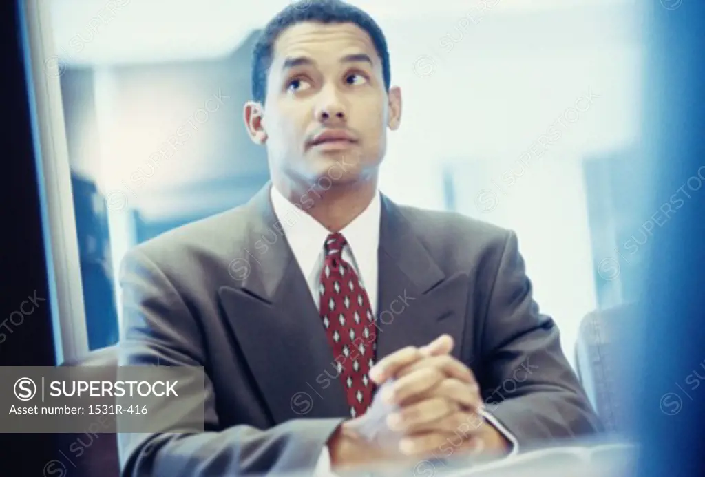 Businessman seated at a desk