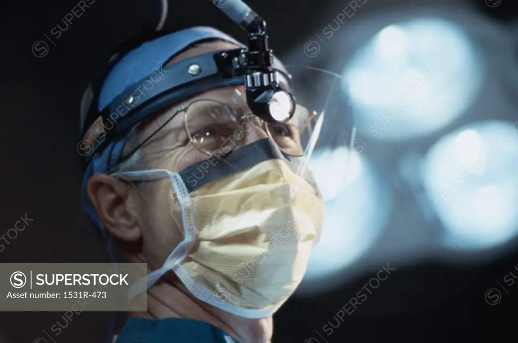 Close-up of a male surgeon wearing a mask