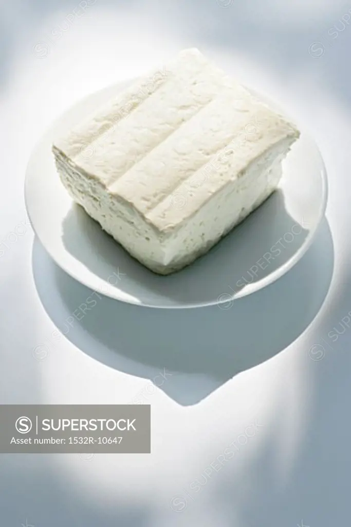 Block of tofu on a plate