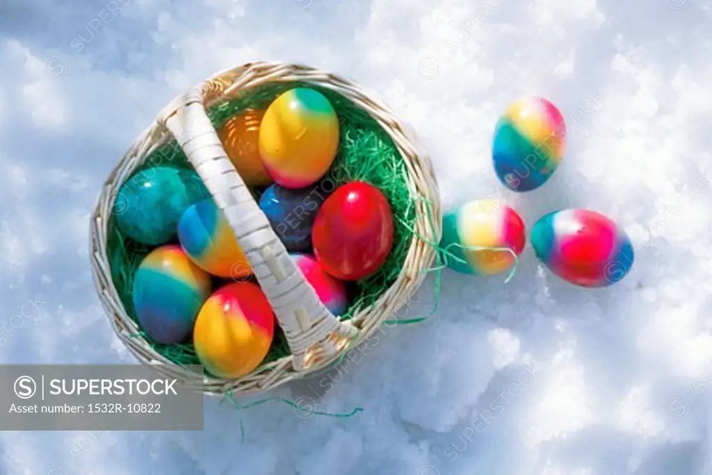Coloured Easter eggs with a small basket