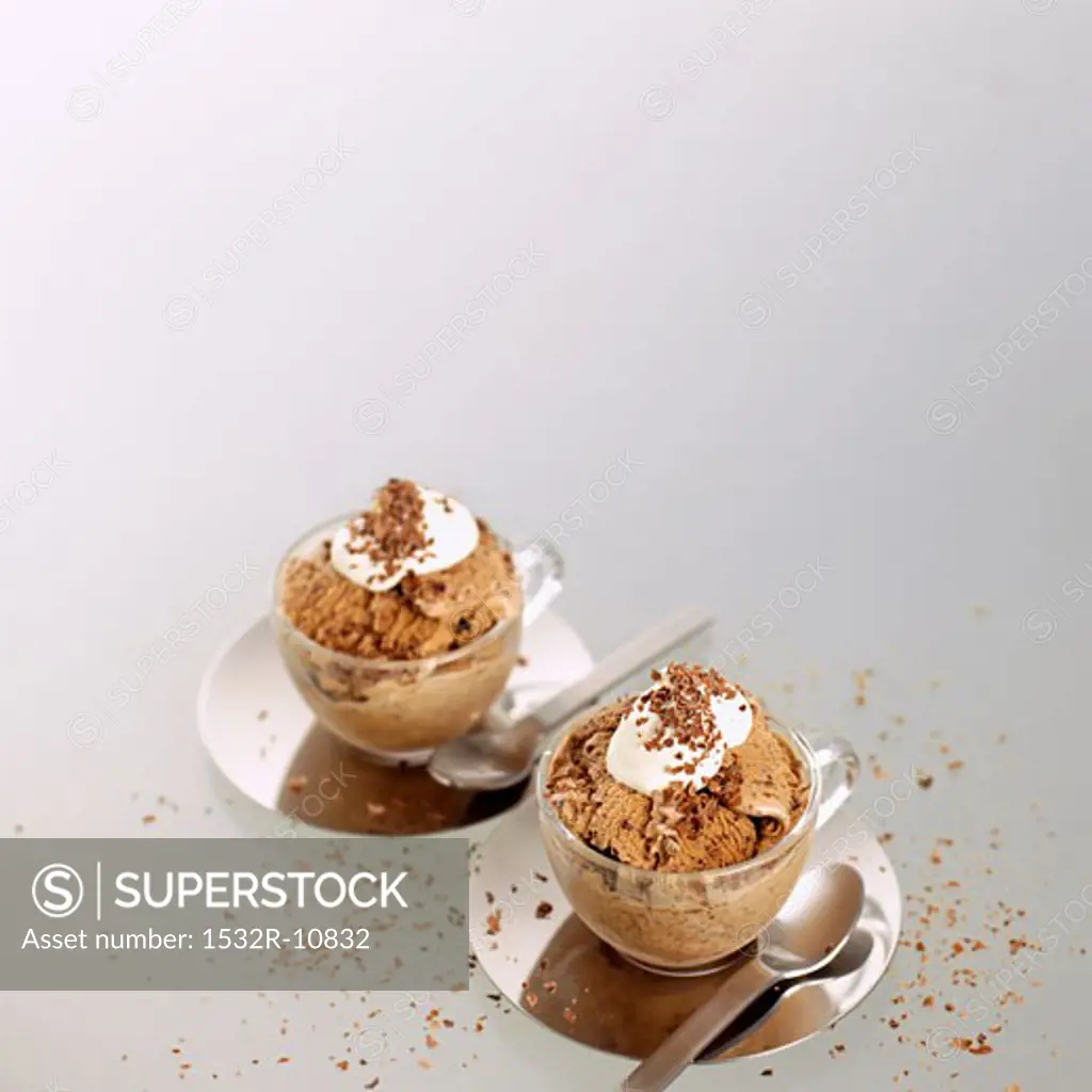 Home-made mocha ice cream in glass cups with whipped cream