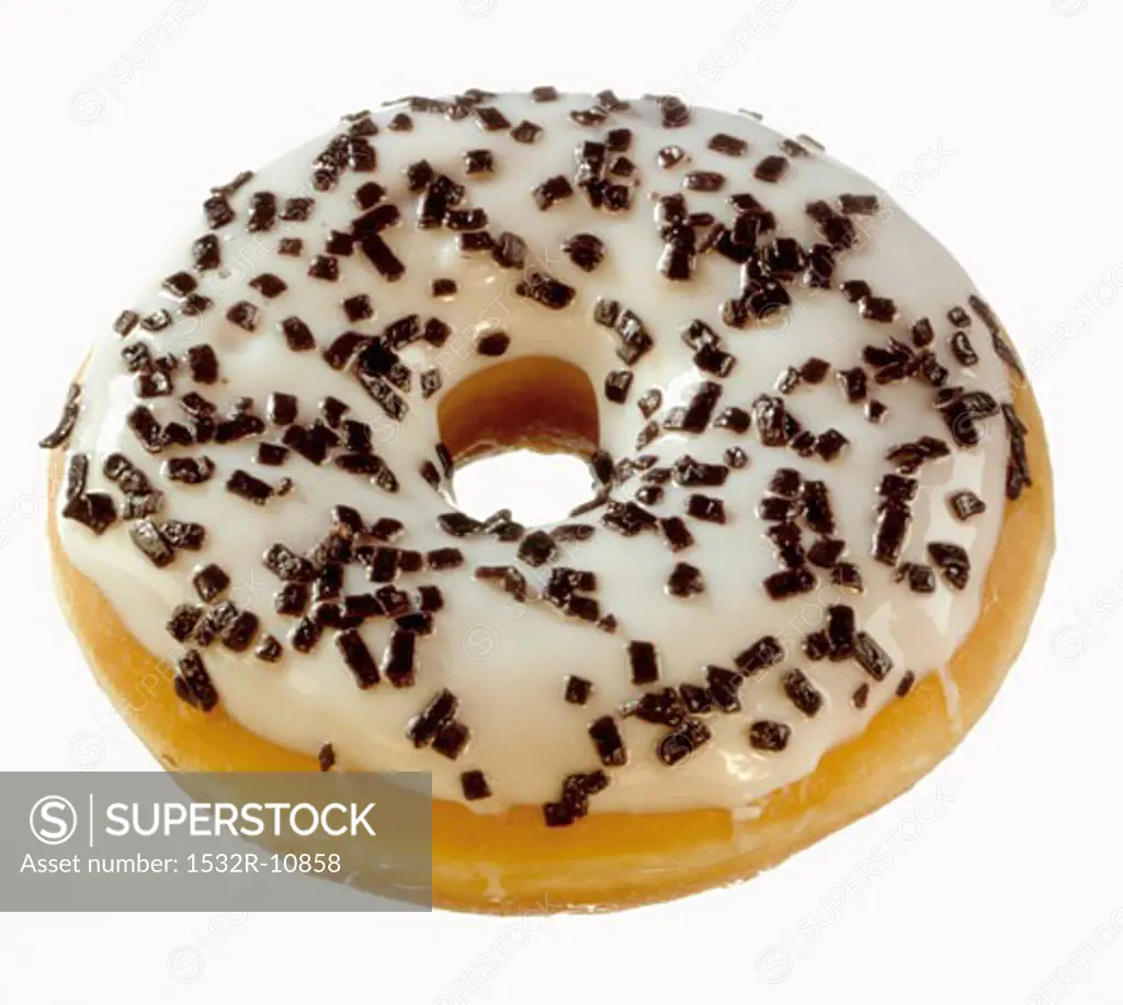 Doughnut decorated with glacT icing and chocolate sprinkles