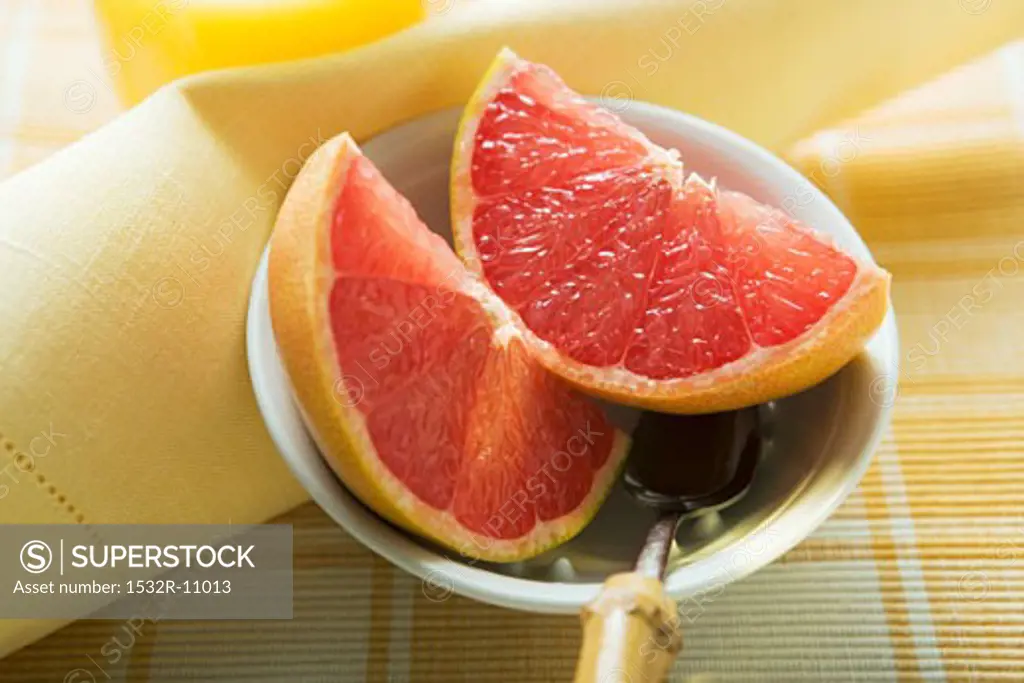 Grapefruit wedges in a bowl