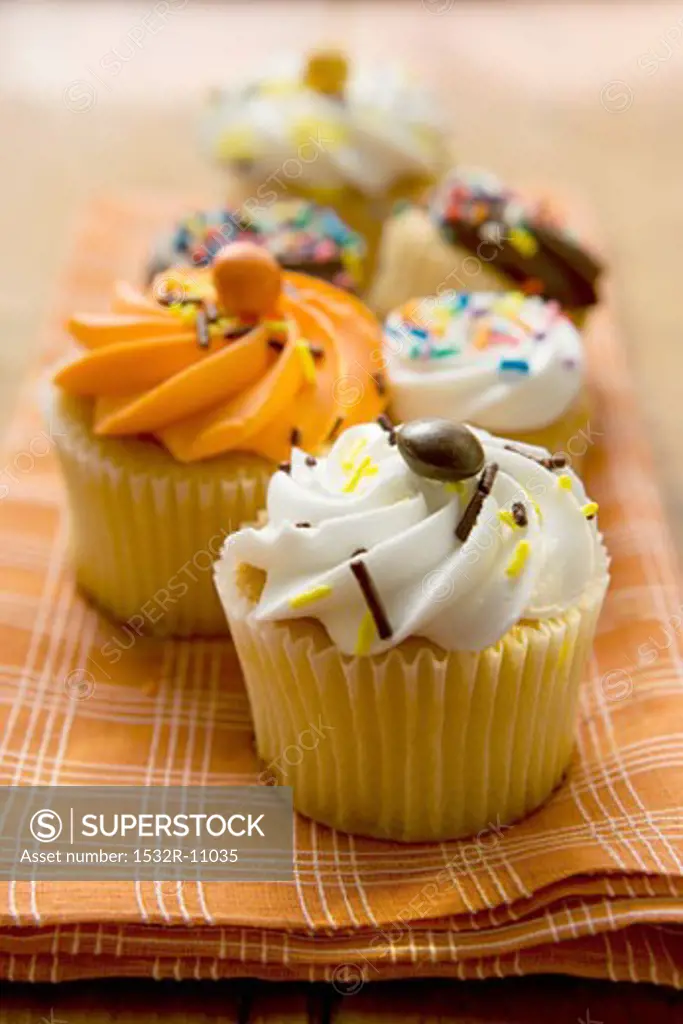 An assortment of decorated muffins