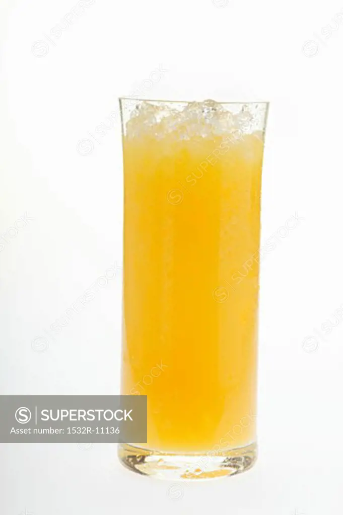 Orange juice in glass with crushed ice