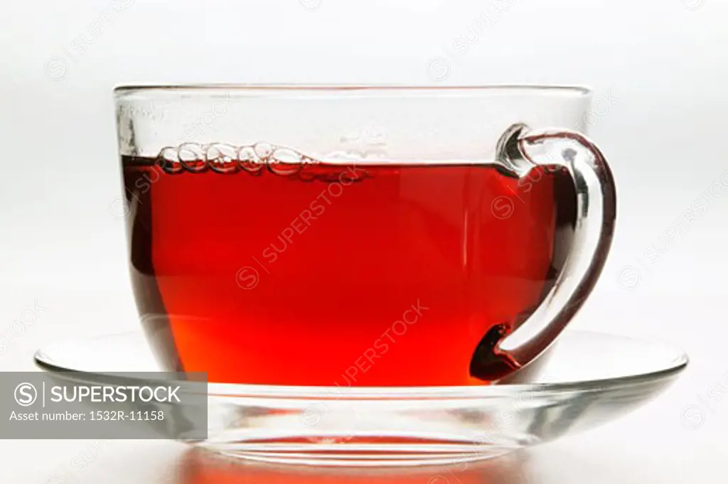 Hot hibiscus tea in glass cup