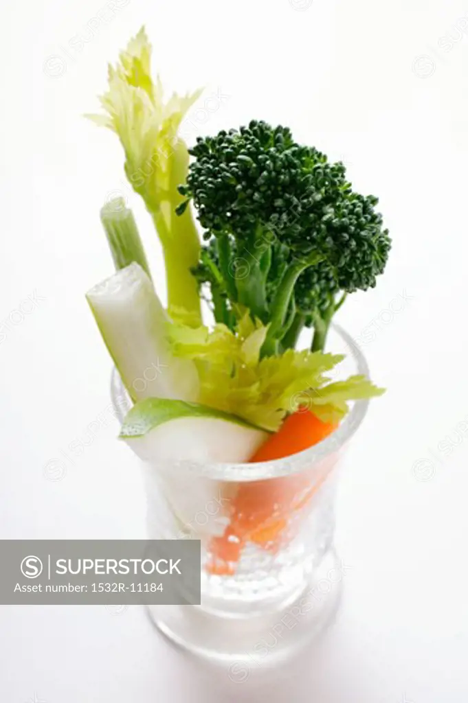 Celery, broccoli and carrots in glass
