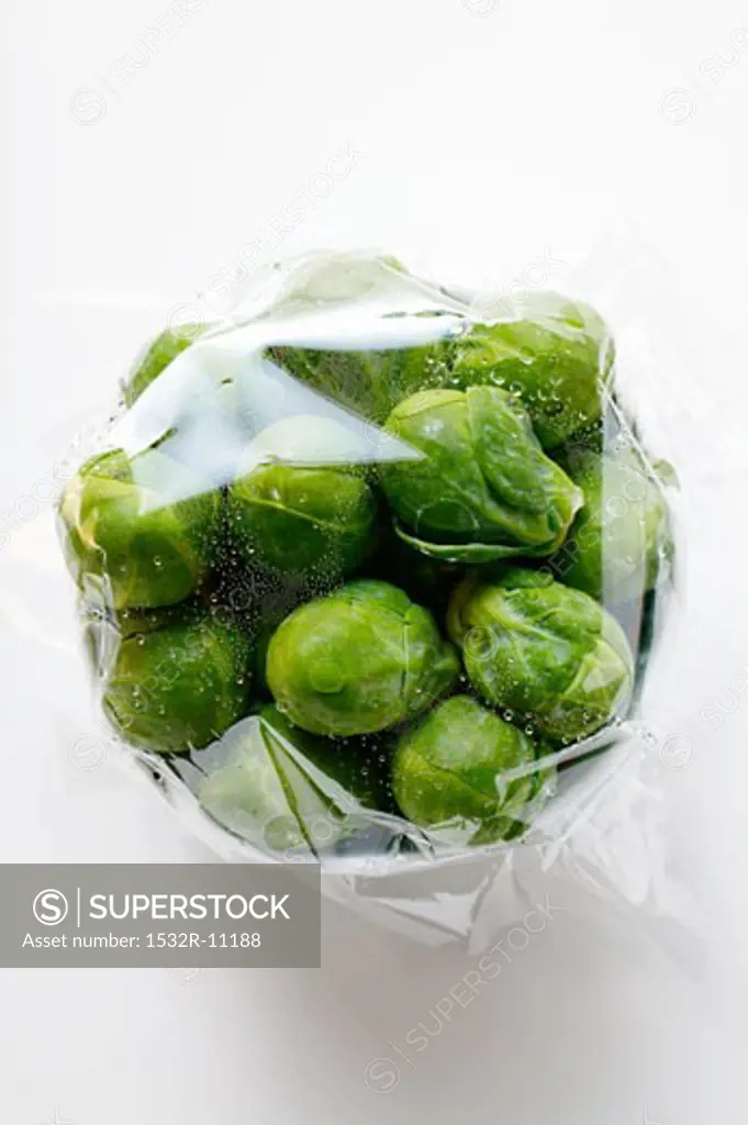Brussels sprouts, covered with food wrap