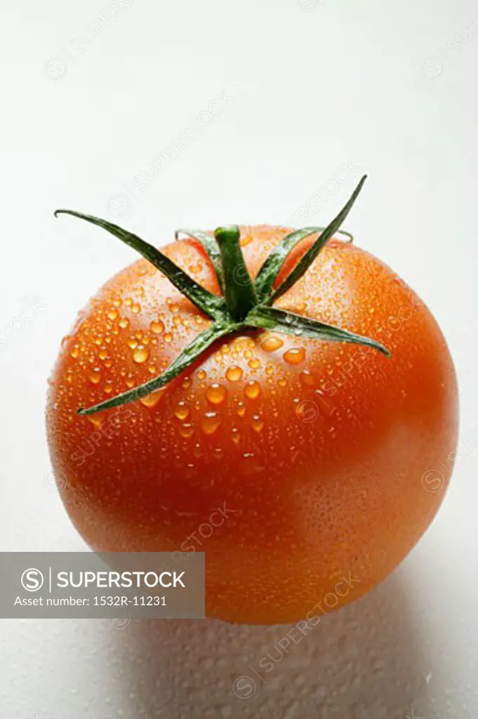 Tomato with drops of water