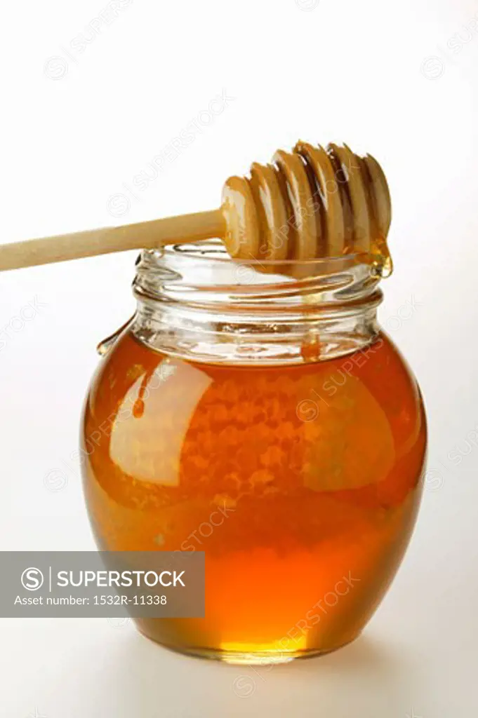 Honey in jar with honeycomb (4)