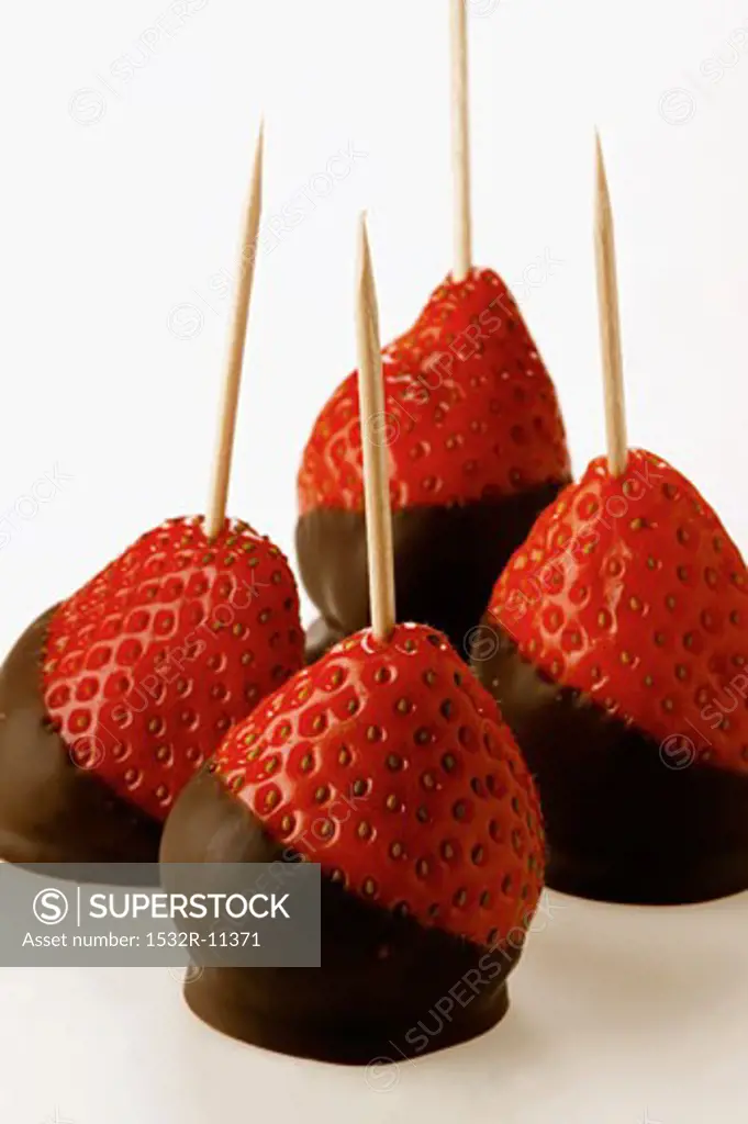 Chocolate-coated strawberries on toothpicks (1)