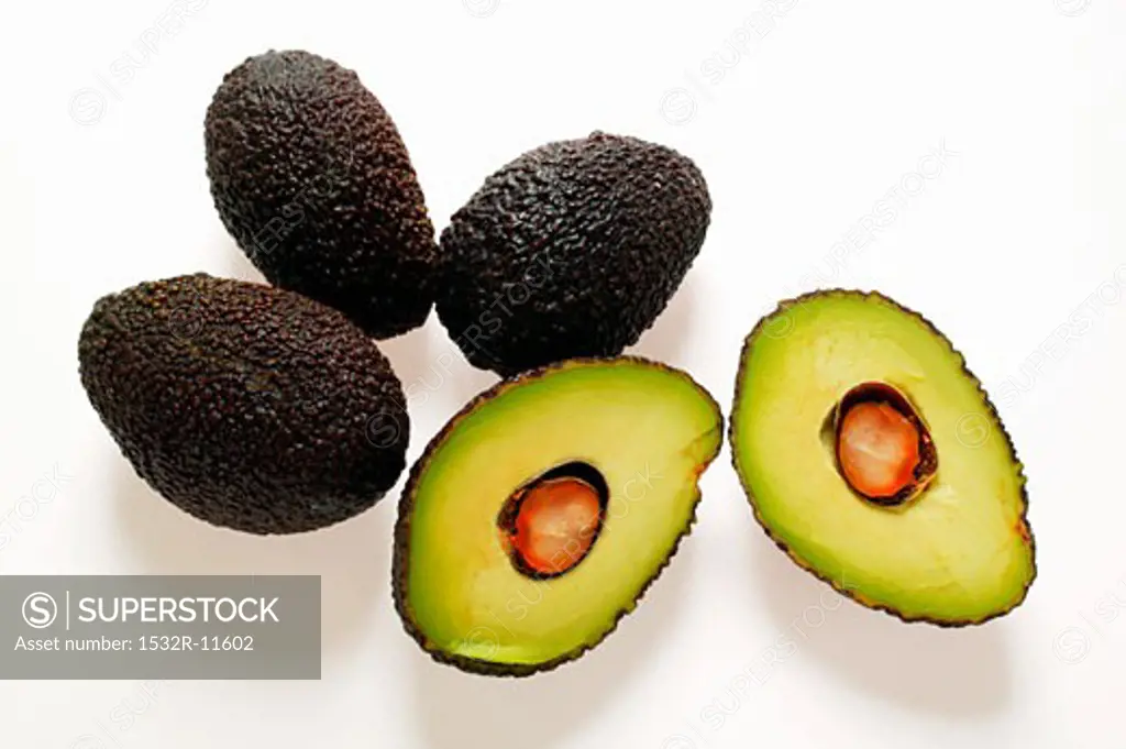 Mini-avocados, whole and halved