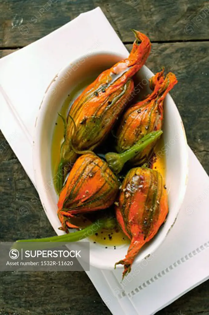Marinated stuffed courgette flowers