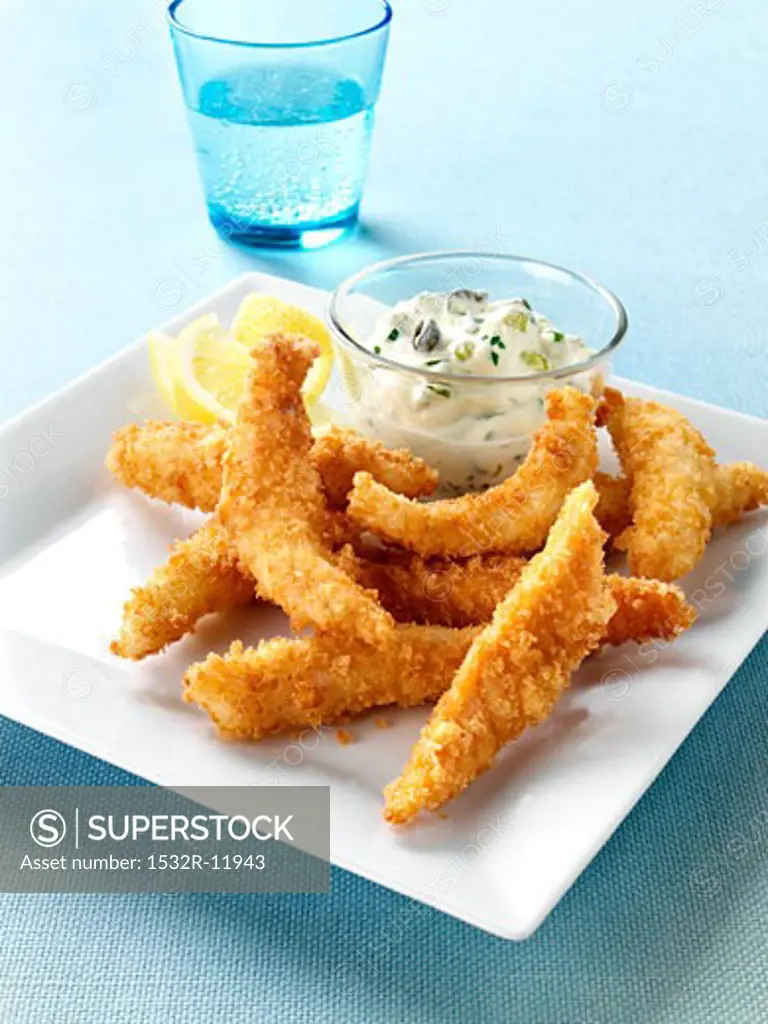 Breaded strips of fish with tartare sauce