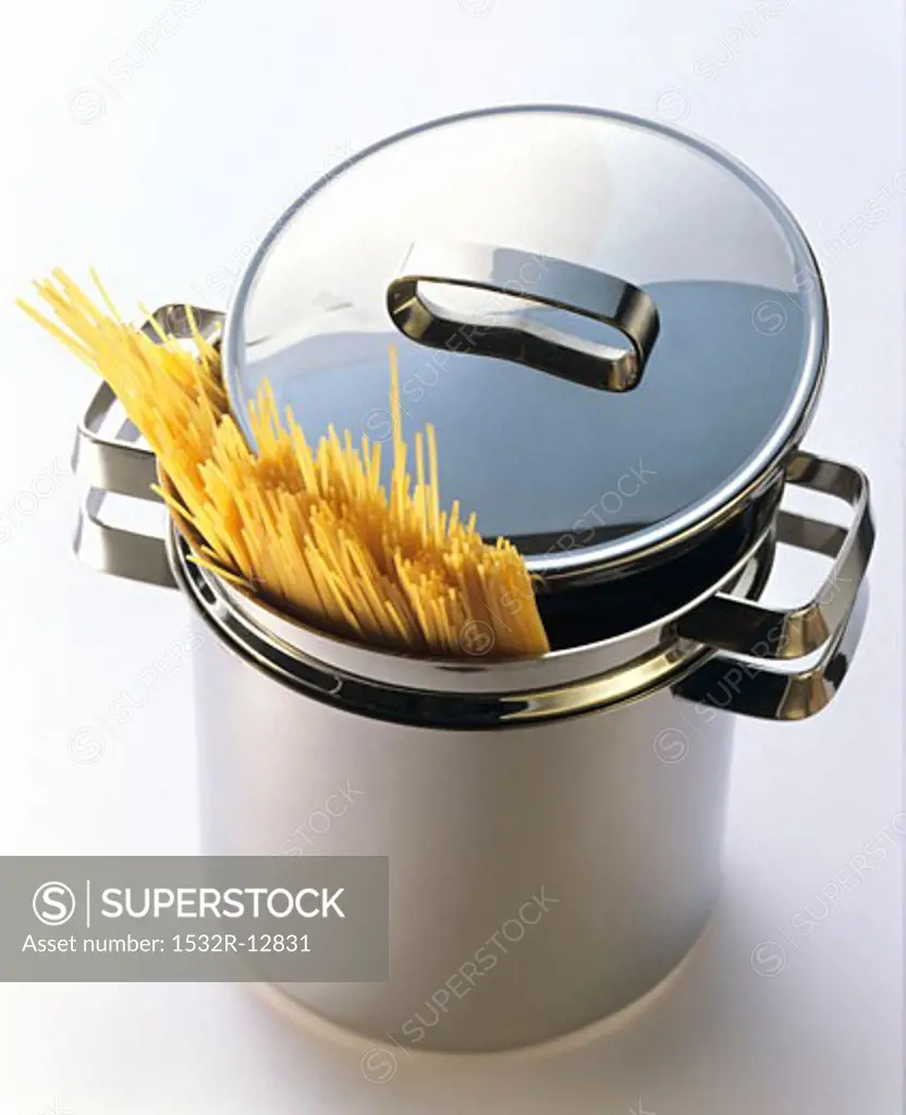 Uncooked Spaghetti in a Stainless Steel Pot