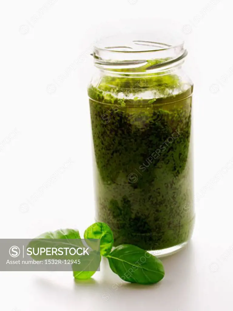 A Jar of Pesto with Basil Leaf