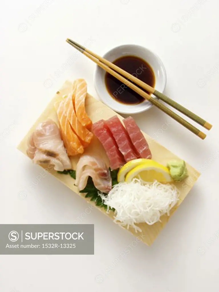 A Sushi Assortment with Sauce and Chopsticks