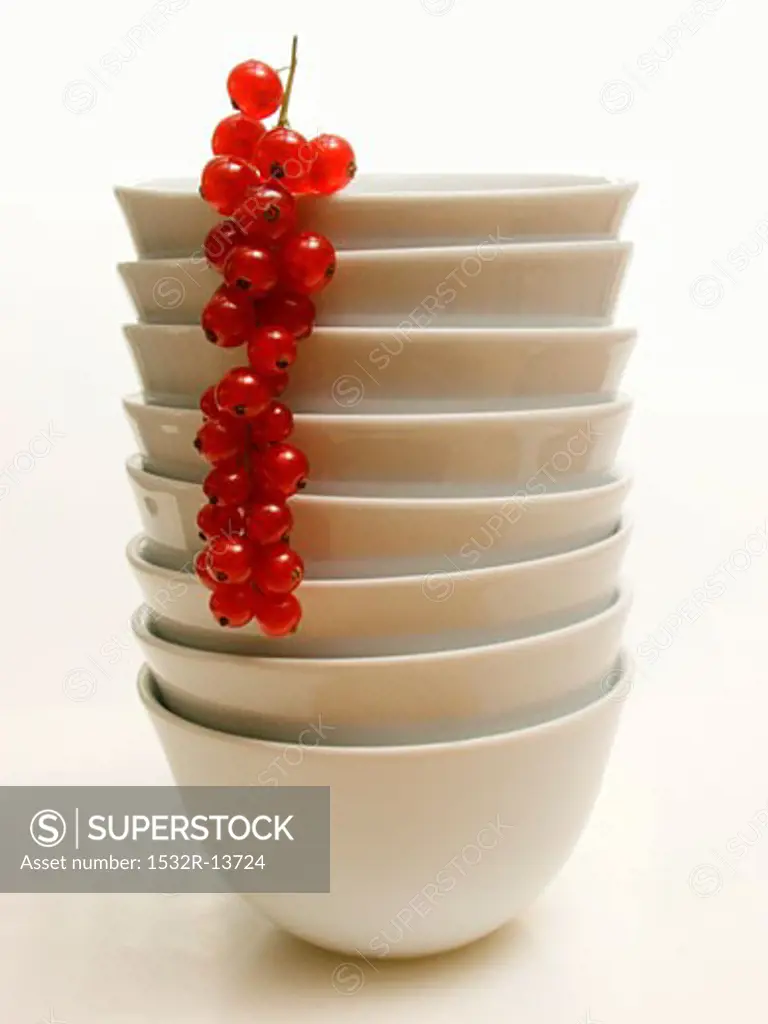 Stacked White Bowls with Red Currants