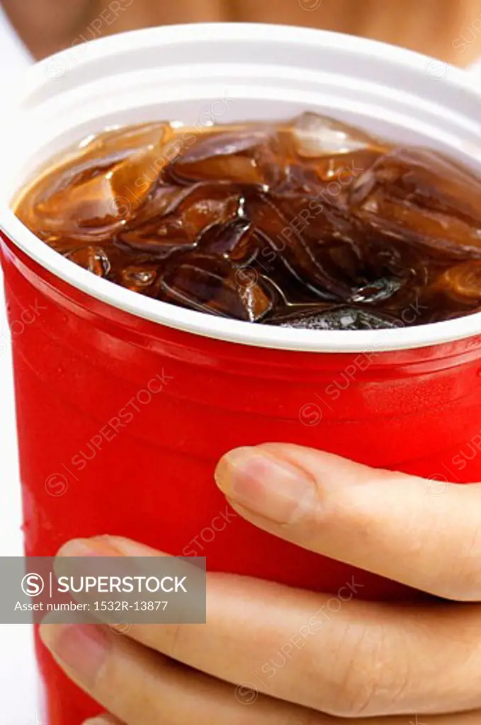 Holding a Cup of Cola