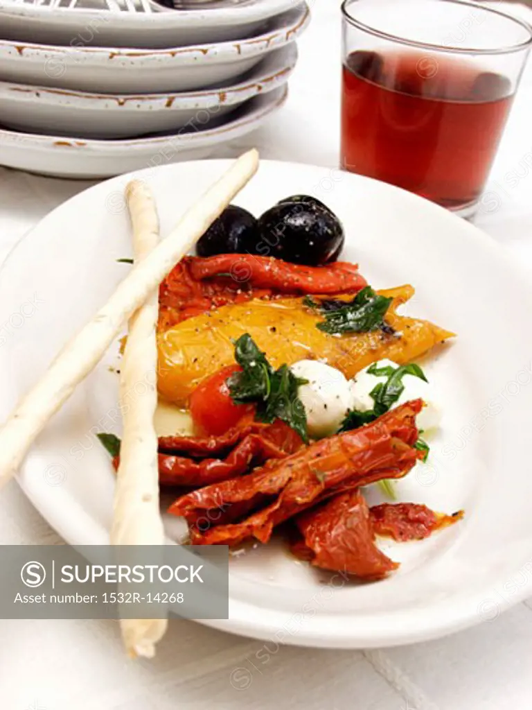 Antipasto with Marinated Vegetables and Bread Sticks