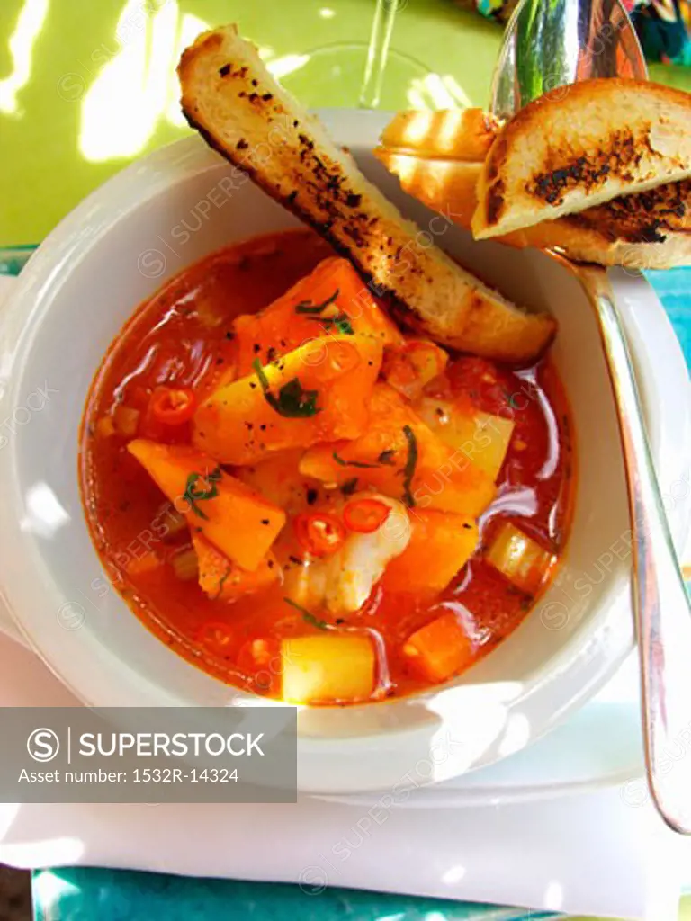 Spicy Creole fish soup with sweet potatoes