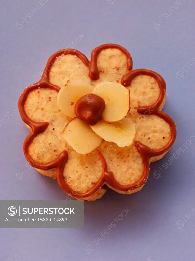 Nut nougat flower with flaked hazelnuts
