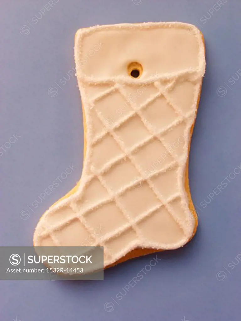 White decorated sweet pastry biscuit (boot)