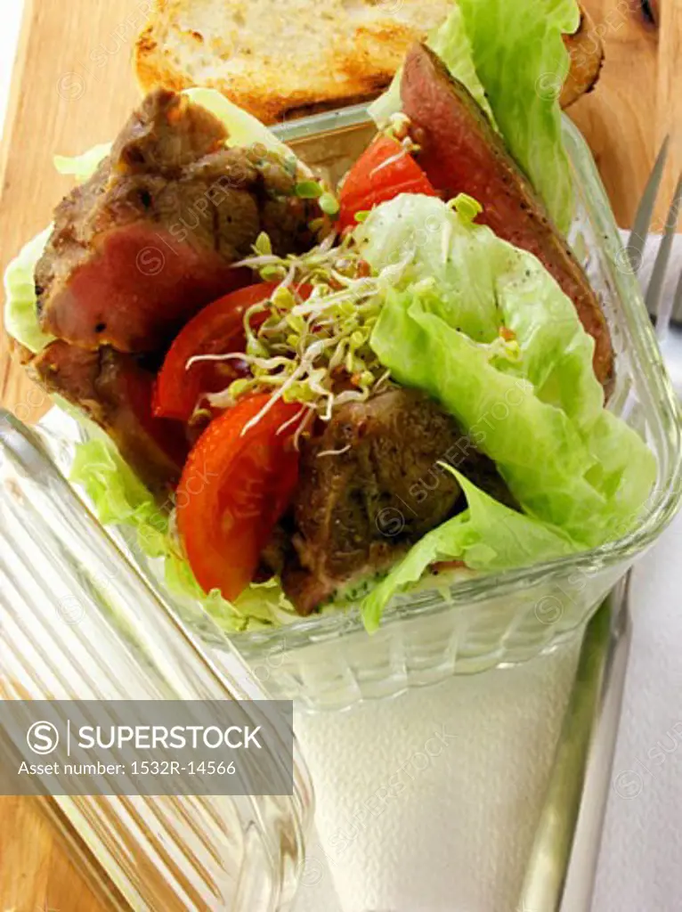 Lettuce with barbecued pork neck for lunch