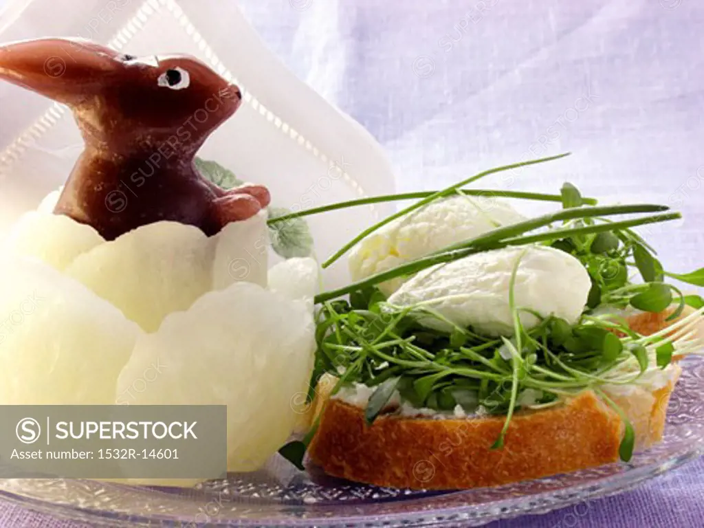 Cream cheese sandwich with cress, wax Easter Bunny