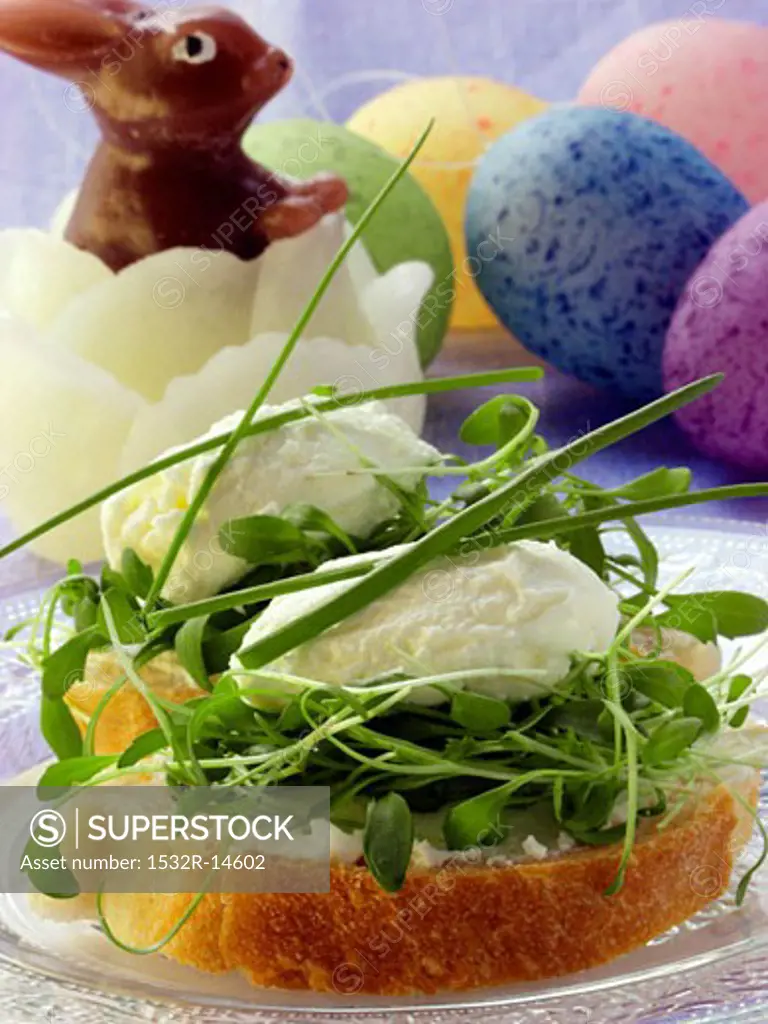 Cream cheese sandwich with cress, wax Easter Bunny, Easter eggs
