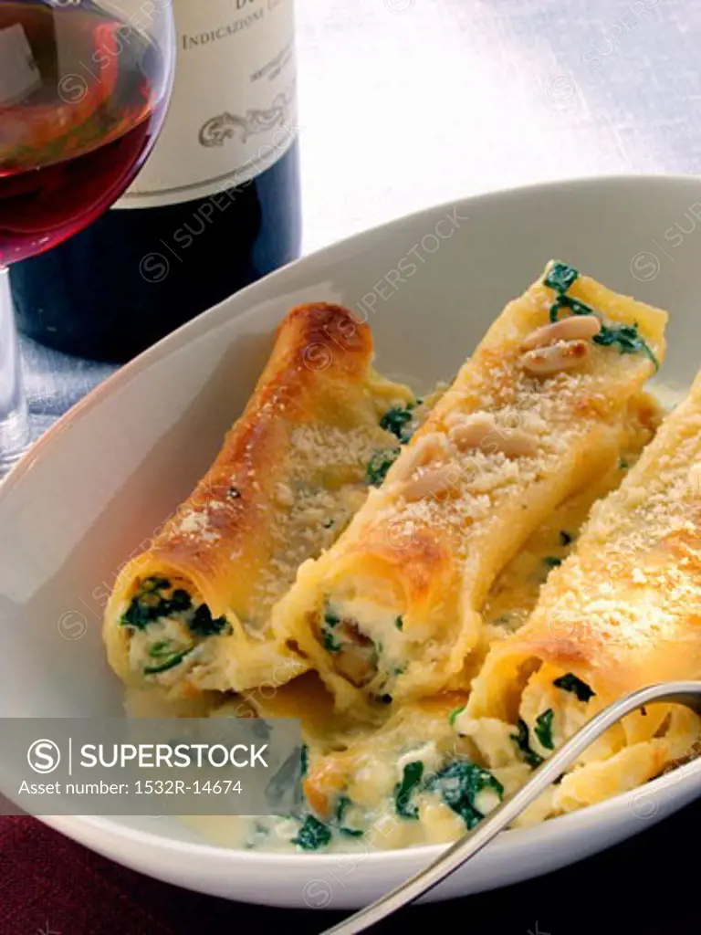 Cannelloni with spinach and pine nuts, red wine