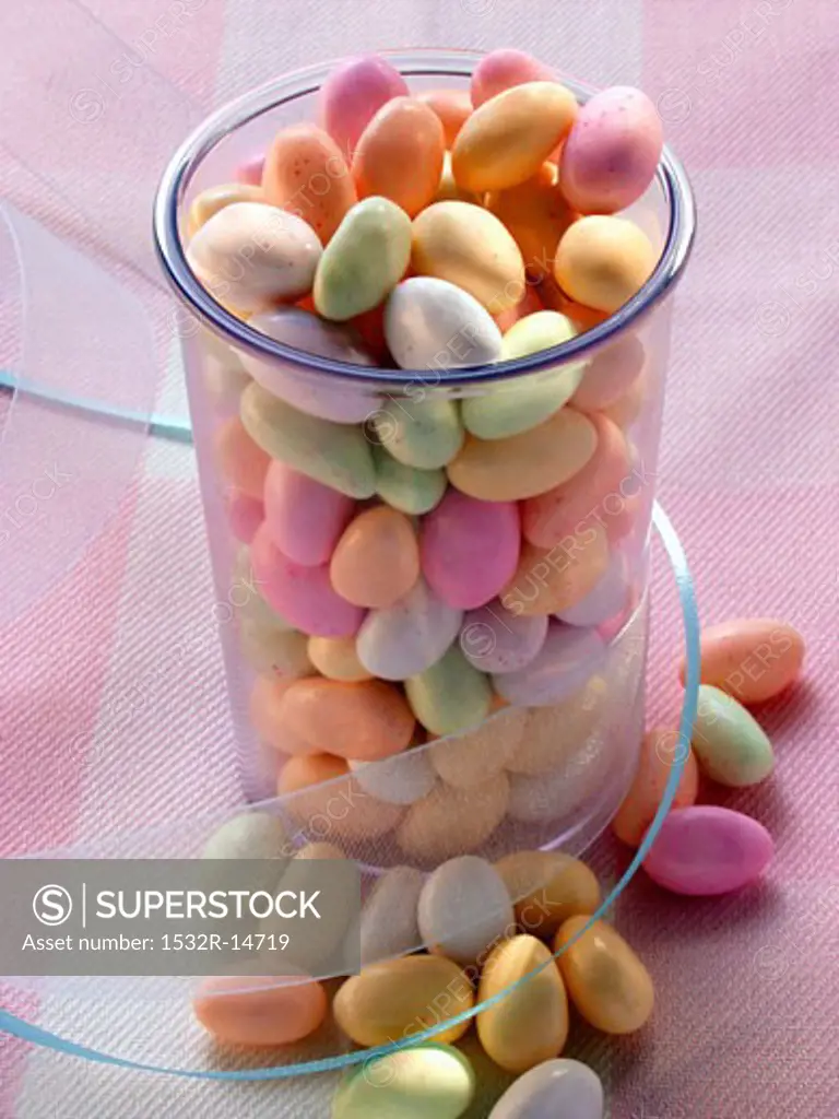 Pastel-coloured sugar eggs (jelly beans) for giving
