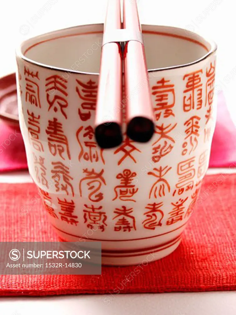 Asian bowl with chopsticks