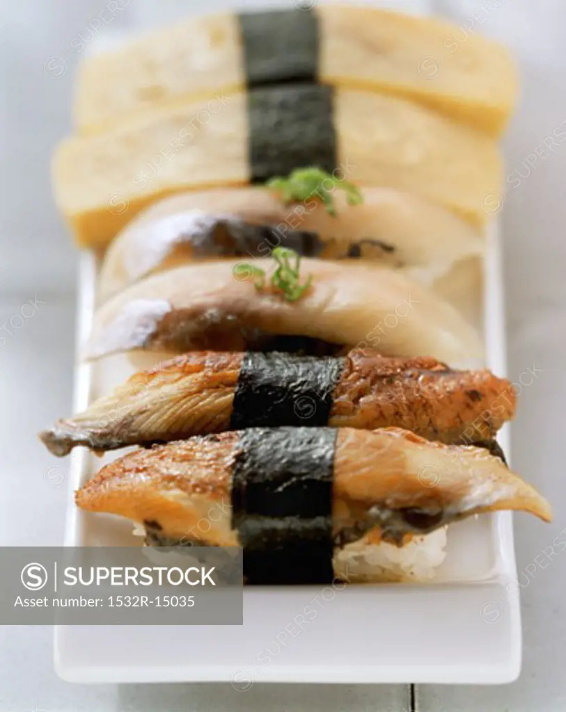 Nigiri sushi with mackerel, eel and egg custard
