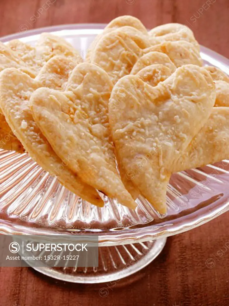 Parmesan hearts on glass plate