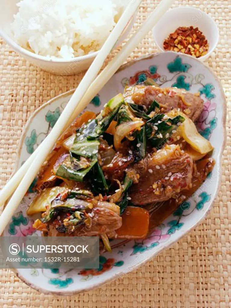 Duck with chard and sesame, mixed spices, rice