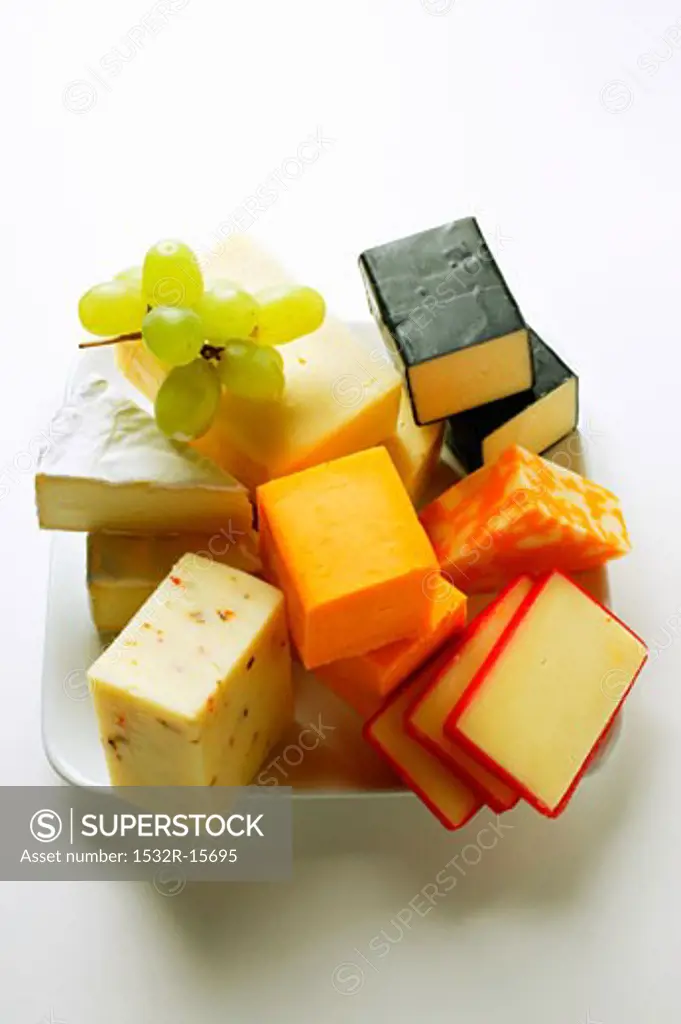 Various types of cheese with grapes