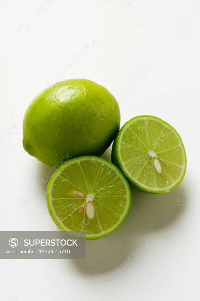 Two Key limes, one halved