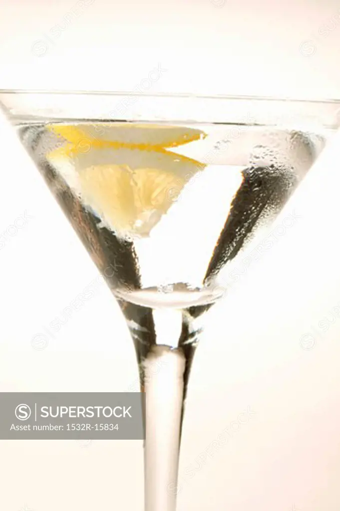 Martini with wedge of lemon
