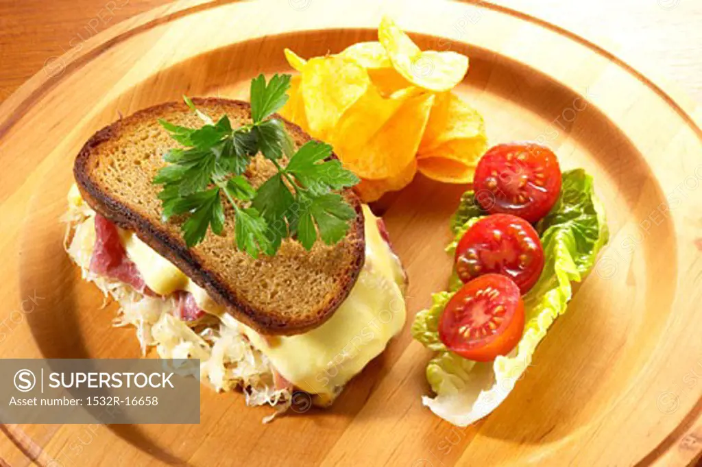 Reuben sandwich: cheese, corned beef and sauerkraut