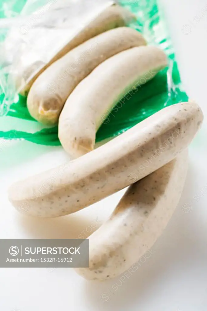 White sausages with packaging