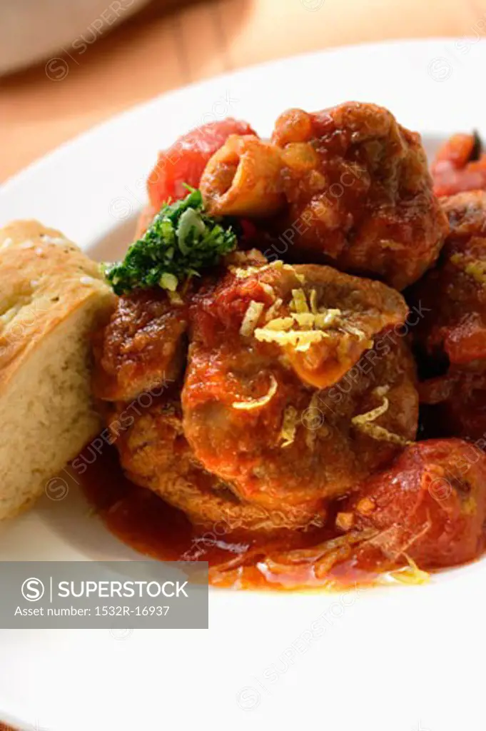 Osso buco with tomatoes and focaccia